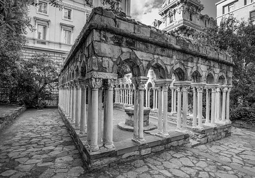 Ruins of St Andrew's monastery (in black and white) in the centre of Genoa, Italy