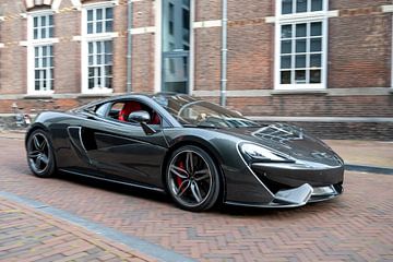 McLaren 570S sports car driving fast by Sjoerd van der Wal Photography