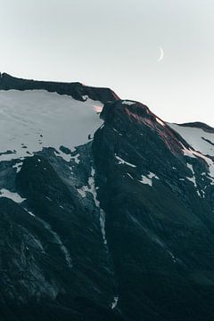 Snow capped mountain in evening sun and moonlight - Norway photo print | Small moon | photography by Elise van Gils