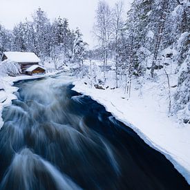 River and watermill in a Finnish winter landscape by Martijn Smeets