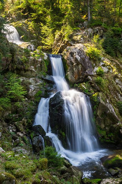 Magical waterfall over several terraces in the forest by adventure-photos