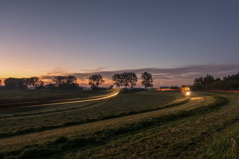 Aan het werk in de avondzon van Marco Bakker