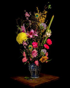 Colourful still life of flowers with peacock feathers.