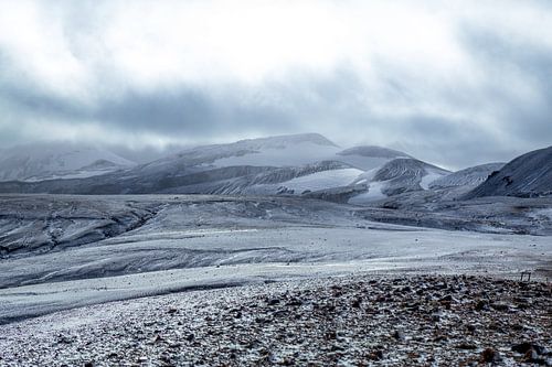 Snow covered mountains at Landmannalaugar Iceland by Ken Costers