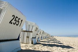 Sylt: beach chairs in front of Westerland  by Norbert Sülzner
