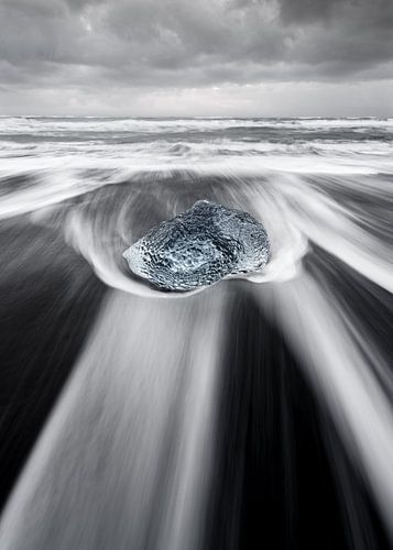 Big block of ice in the surf