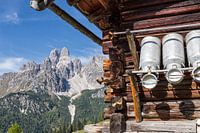 Alpine hut with milk jugs