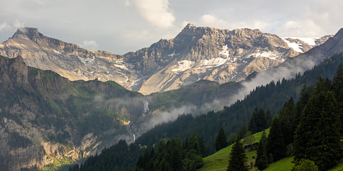 Drifting clouds in an Alpine valley