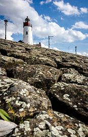 The Lighthouse On Urk In the Netherlands from a Low Perspective by Frank Dinnissen