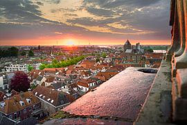 Old roofs bathed in the light of the sunset over the Hanseatic city of Kampen by Fotografiecor .nl