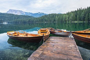 Black Lake with boats near Durmitor Mountains, Montenegro, glacial lake by Lizzy Komen