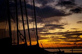 A beautiful morning, full of color in the sky, the start of a new day. by Hans de Waay