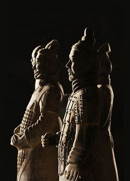 Beautiful lit Warriors from the  Terracotta army in Xi’an by Tony Vingerhoets
