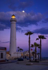 Captivating Twilight at Punta Secca Lighthouse Under a Glowing M by PhotoCluster