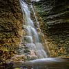 Ein kleiner Wasserfall im Rautal in Jena im Herbst von Wolfgang Unger