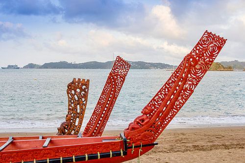 Three beautifully carved Maori boats