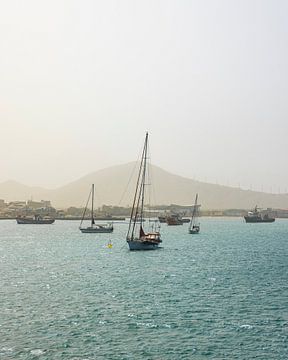 Sailboats at anchor on the coast of Cape Verde by mitevisuals