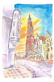 Festliche Landshuter Altstadt mit beleuchteten Wolken und Sankt Martin bei Sonnenuntergang