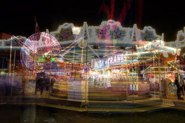 Fair in the evening at Sittard's Oktoberfest, double shot & long shutter speed