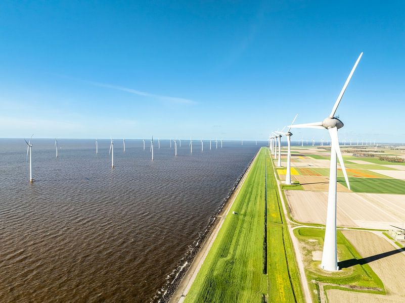 Wind turbines in lakeshore wind park producing electricity by Sjoerd van der Wal Photography
