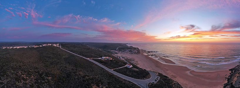 Air panorama of Monte Clerigo beach at sunset in Portugal by Eye on You