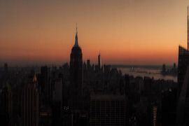 Sunset over Manhattan by Piotr Snoch