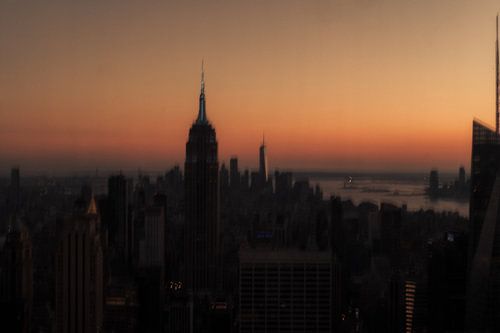 Sonnenuntergang über Manhattan von Piotr Snoch