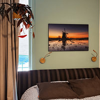 Klantfoto: Schaatsen bij de Ypeymolen in Ryptsjerk bij zonsondergang van KB Design & Photography (Karen Brouwer), als ArtFrame