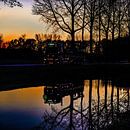 Lighted truck is reflected in the water of the river Linge by Anne Ponsen thumbnail