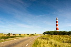 classic lighthouse in red and white at Dutch island Ameland by Ivonne Wierink