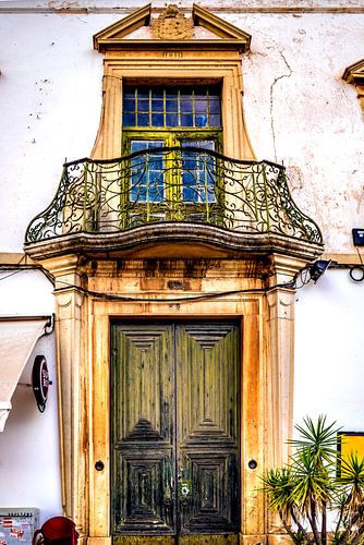 Old house with balcony