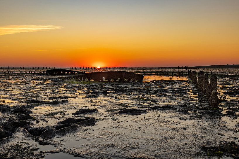 Wadden Sea, sunrise at Paesens Moddergat (Shipwreck of Wierum) by Gert Hilbink