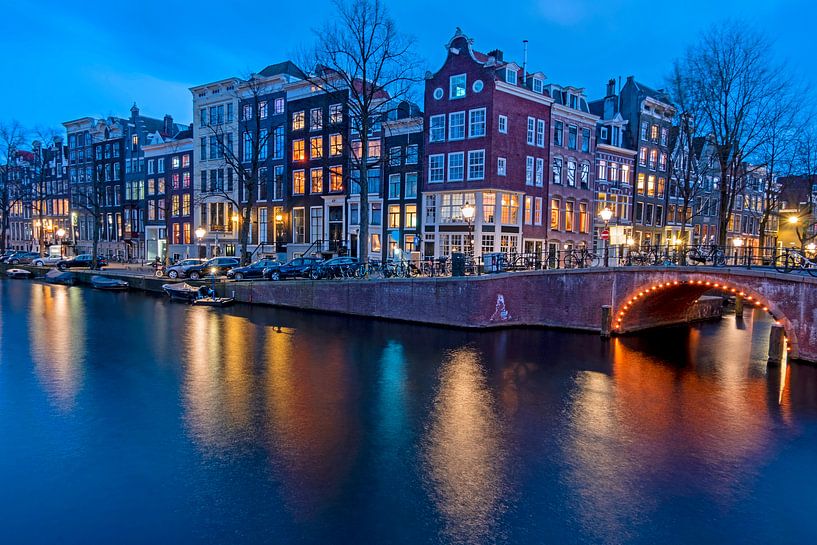 Cityscape of Amsterdam at sunset by Eye on You