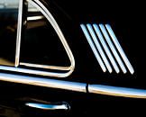 Window and rear door of a classic car by Harrie Muis thumbnail