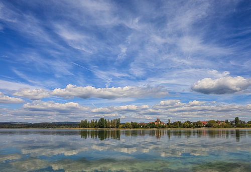The lakeside landscape of Reichenau Island with the Church of St Peter and Paul – Lake Constance