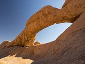 Natural rock arch at the Spitzkoppe mountain in Namibia by Teun Janssen thumbnail