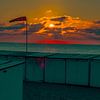 Zonsondergang in zee van Freddie de Roeck