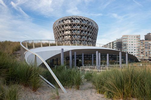 The Silt Hotel Casino among the dune grass in Middelkerke by Simon Peeters