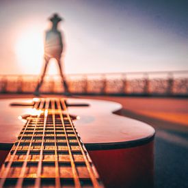 creative concept, guitar at sunset with model by Martijn Van Weeghel