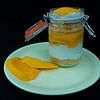 Mango yogurt cream bisquit and fresh fruit in a glass by Babetts Bildergalerie