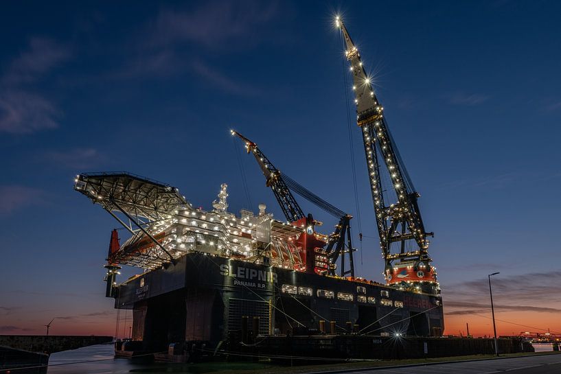 Dutch glory: The largest lifting platform in the world, the Sleipnir of Heerema, is moored along the by Jaap van den Berg