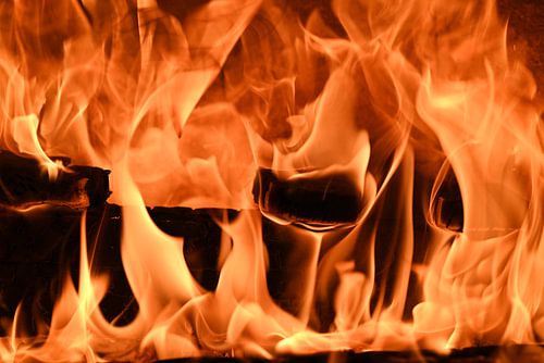 Flames in the fireplace as a close-up