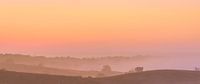 Posbank roze en oranje zonsopgang