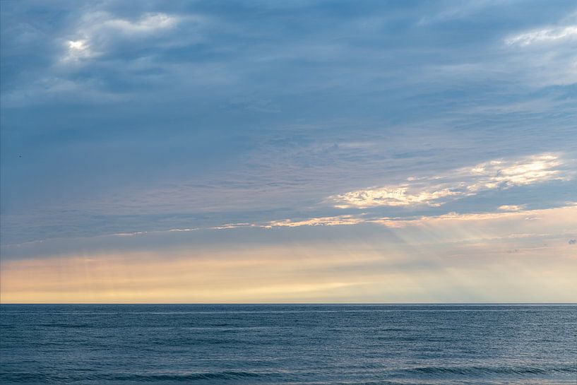 Silent expanse over the Baltic Sea in the evening sky by Alexander Baumann