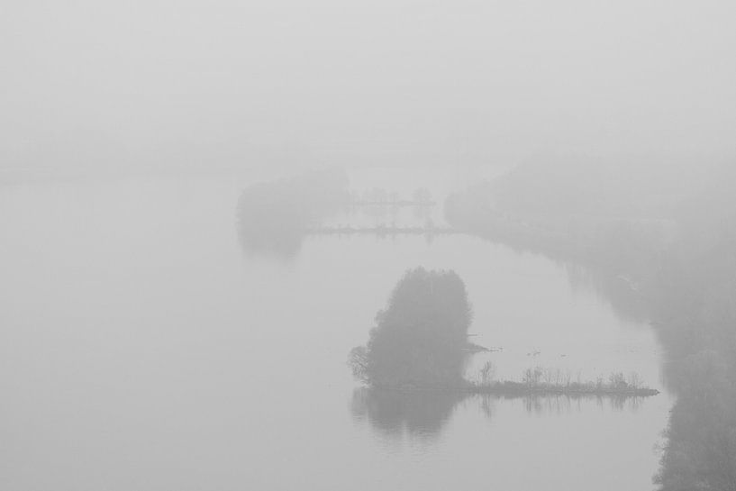 Minimalistic landscape with thick fog over river and river bank by Robert Ruidl