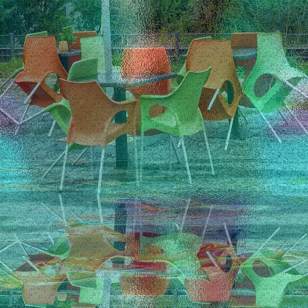 It's raining - Colorful chairs behind glass by Christine Nöhmeier