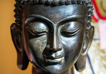 buddha statue in a temple by Animaflora PicsStock