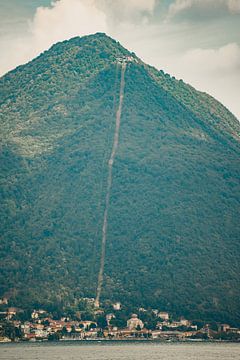 Sasso del Ferro mountain towers over Brenna by Joep van de Zandt