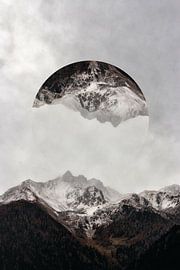 Snowy area with mountains and low hanging fog by Tom IJmker