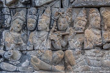 Stone detail Buddhist figures Java by Sander Groenendijk